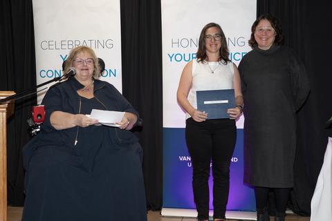 Dr. Sarah Carruthers being presented the Access and-Inclusion Award by the President and Linda Dersksen.jpg